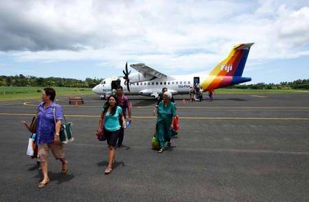 Passangers getting out of Pacific Sun airplane, Labasa airport, Vanua Levu island, Fiji, South Pacificのeditorial素材