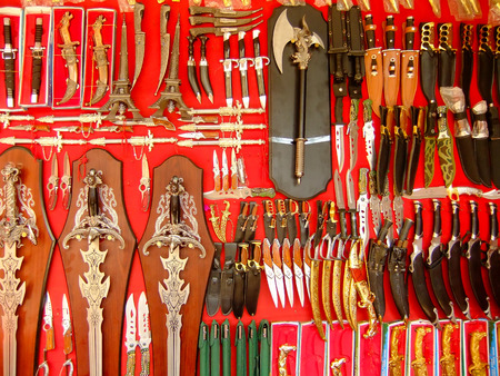 Display of weaponry at the street market, Pushkar, Rajasthan, Indiaのeditorial素材