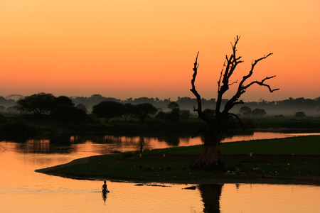 Colorful sunset at the lake, Amarapura, Mandalay region, Myanmarの写真素材