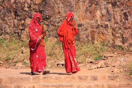 Indian women in colorful saris walking at Ranthambore Fort, Rajasthan, Indiaのeditorial素材