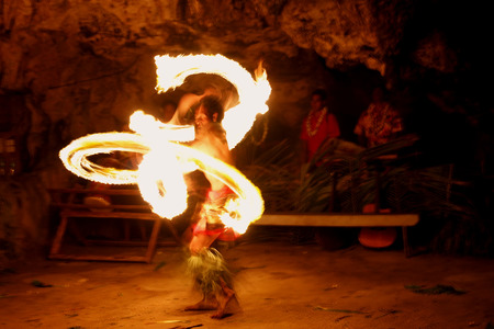 Fire show in famous Hina cave, blurred motion, Oholei beach, Tongatapu island, Tongaのeditorial素材