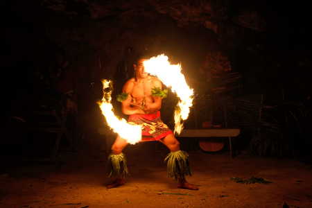 Fire show in famous Hina cave, blurred motion, Oholei beach, Tongatapu island, Tongaのeditorial素材