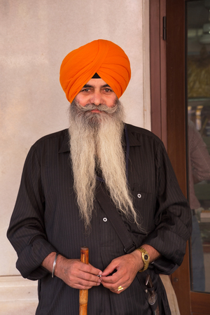 Long-bearded man standing at Chandni Chowk, New Delhi, Indiaのeditorial素材