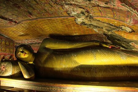 Reclining Buddha at Golden Temple of Dambulla in Sri Lanka. It is the largest and best preserved cave temple complex in the country.のeditorial素材