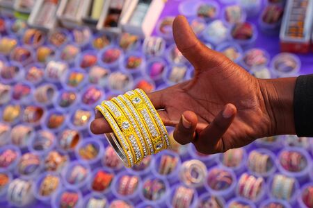 Man showing bracelets at the market, Jaipur, India