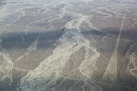Aerial view of Nazca Lines - Triangle legeoglyphs in Peru. The Lines were designated as a UNESCO World Heritage Site in 1994.の写真素材