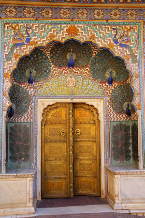 Peacock Gate in Pitam Niwas Chowk, Jaipur City Palace, Rajasthan, India. Palace was the seat of the Maharaja of Jaipur, the head of the Kachwaha Rajput clan.のeditorial素材