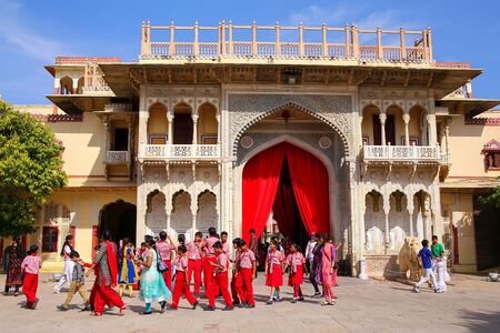Local school kids walking out of Rajendra Pol in Jaipur City Palace, Rajasthan, India. Palace was the seat of the Maharaja of Jaipur, the head of the Kachwaha Rajput clan.のeditorial素材