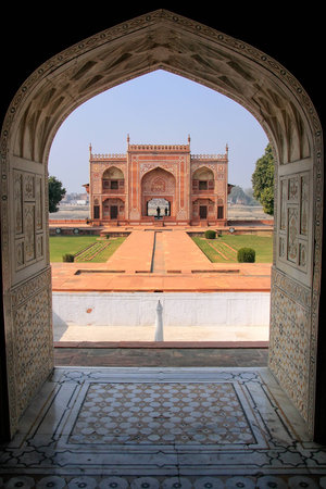 Entrance gate seen from interior of Itimad-ud-Daulah Mausoleum in Agra, Uttar Pradesh, India. This Tomb is often regarded as a draft of the Taj Mahal.のeditorial素材