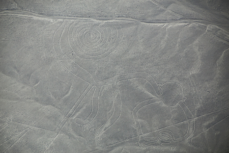 Aerial view of Nazca Lines - Monkey geoglyph, Peru. The Lines were designated as a UNESCO World Heritage Site in 1994.の写真素材
