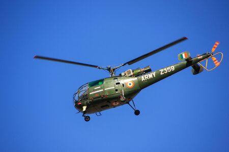 Military helicopter in blue sky, Jaipur, Rajasthan, India. The Army Aviation Corps is a component of the Indian Army, formed on 1 November 1986.のeditorial素材