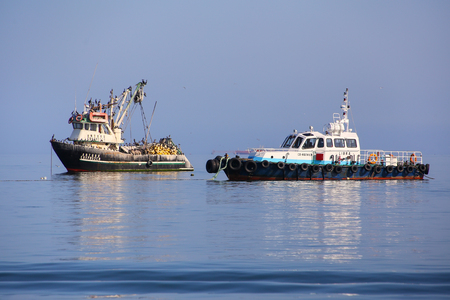 Local boats anchored in Paracas Bay, Peru. Paracas is a small port town catering to tourists visiting Paracas Reserve and Ballestas islands.のeditorial素材