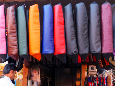 Display of motorbike seat covers at the street market in Jaipur, Rajasthan, India. Jaipur is the capital and the largest city of Rajasthan.のeditorial素材