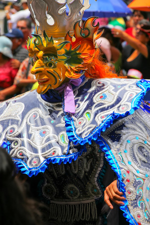 Local man dancing during Festival of the Virgin de la Candelaria in Lima, Peru. The core of the festival is dancing and music performed by different dance schools.のeditorial素材