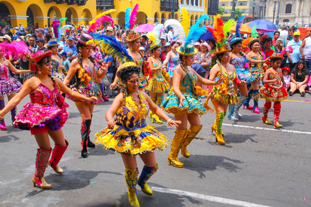 Local women dancing during Festival of the Virgin de la Candelaria in Lima, Peru. The core of the festival is dancing and music performed by different dance schools.のeditorial素材