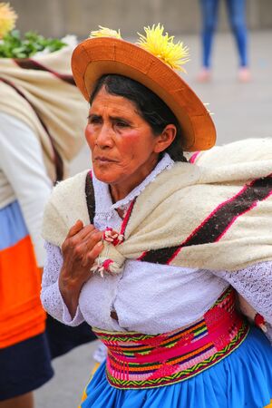 Local woman dancing during Festival of the Virgin de la Candelaria in Lima, Peru. The core of the festival is dancing and music performed by different dance schools.のeditorial素材