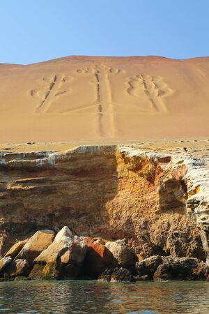 Candelabra of the Andes in Pisco Bay, Peru. Candelabra is a well-known prehistoric geoglyph found on the northern face of the Paracas Peninsulaの写真素材