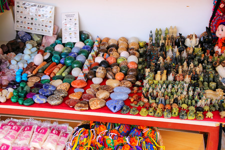 Display of souvenirs at Salinas de Maras - salt evaporation ponds in Maras, Peru. These salt pans are in use since Inca times.のeditorial素材