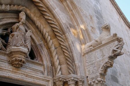 Doorway detail of Cathedral of Saint Mark in Korcula old town, Croatia. Korcula is a historic fortified town on the protected east coast of the island of Korculaの写真素材