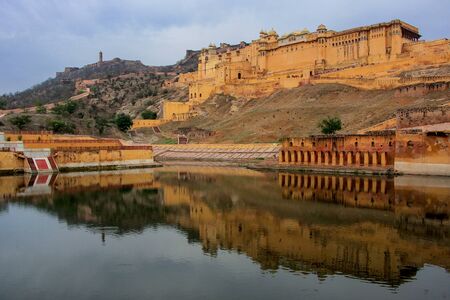 Amber Fort reflected in Maota Lake near Jaipur, Rajasthan, India. Amber Fort is the main tourist attraction in the Jaipur area.のeditorial素材