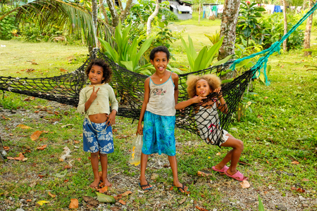 Local girls playing in a small village along Lavena Coastal Walk on Taveuni Island, Fiji. Taveuni is the third largest island in Fiji.のeditorial素材