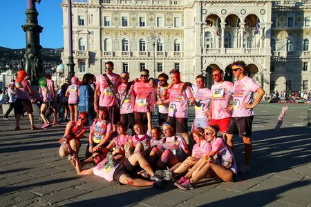 People posing for photos during The Color Run in Trieste, Italy. Trieste is the capital of the autonomous region Friuli-Venezia Giuliaのeditorial素材