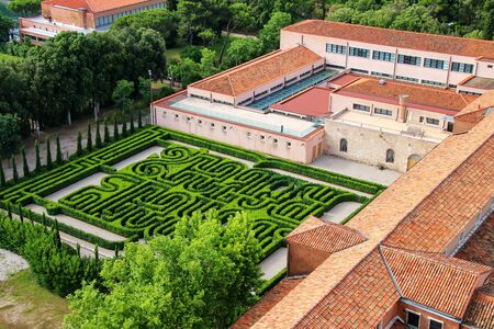 Garden in the courtyard of San Giorgio Monastery in Venice, Italy. It is located on the island of San Giorgio Maggioreのeditorial素材