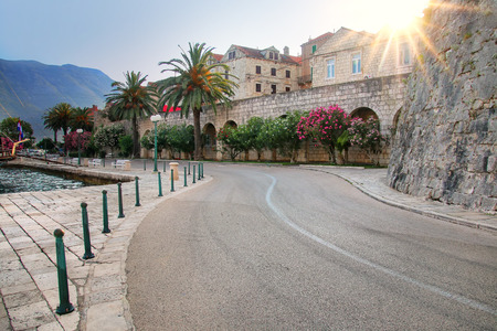 Road around Korcula old town walls, Croatia. Korcula is a historic fortified town on the protected east coast of the island of Korculaの写真素材
