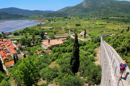 View of Ston town and its defensive wall, Peljesac Peninsula, Croatia. Ston was a major fort of the Ragusan Republicの写真素材