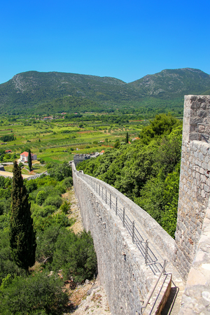 Defensive walls of Ston town, Peljesac Peninsula, Croatia. Ston was a major fort of the Ragusan Republicの写真素材