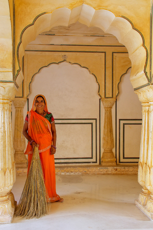 Local woman standing in Sattais Katcheri Hall, Amber Fort, Jaipur, India. Amber Fort is the main tourist attraction in the Jaipur area.のeditorial素材