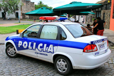 Police car parked at Plaza de Armas in Colonia del Sacramento, Uruguay. It is one of the oldest towns in Uruguayのeditorial素材