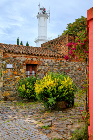 Stone houses and lighthouse in Colonia del Sacramento, Uruguay. It is one of the oldest towns in Uruguayのeditorial素材