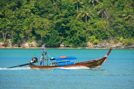 Longtail boat going from Phi Phi Don Island in Krabi Province, Thailand. Koh Phi Phi Don is part of a marine national park.のeditorial素材