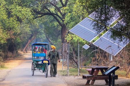 Cycle rickshaw walking in Keoladeo Ghana National Park in Bharatpur, Rajasthan, India.