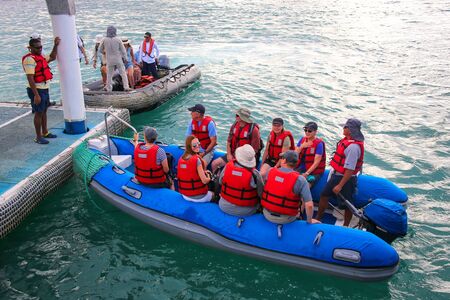 Group of tourists landing at Puerto Ayora on Santa Cruz Island in Galapagos National Park, Ecuador. Puerto Ayora is the most populous town in the Galapagos Islands.のeditorial素材