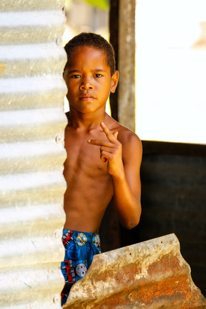 Local boy playing in Lavena village on Taveuni Island, Fiji. Taveuni is the third largest island in Fiji.のeditorial素材