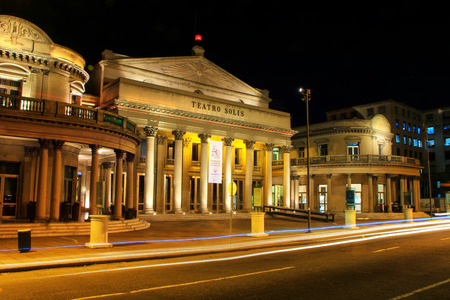 Solis Theater at night with traffic lights in Montevideo old town, Uruguay. It was opened in 1856.のeditorial素材