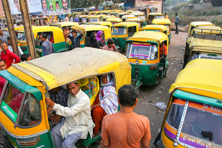 Local people sitting in a tuk-tuk at Kinari Bazaar in Agra, Uttar Pradesh, India. Agra is one of the most populous cities in Uttar Pradeshのeditorial素材