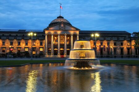 Kurhaus and Bowling Green in the evening with lights, Wiesbaden, Hesse, Germany. Wiesbaden is one of the oldest spa towns in Europeのeditorial素材