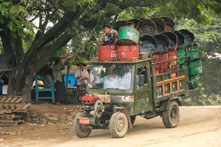 Local people riding in a truck at Ayeyarwady river port in Mandalay, Myanmar. Mandalay is the second largest city in Myanmar.のeditorial素材