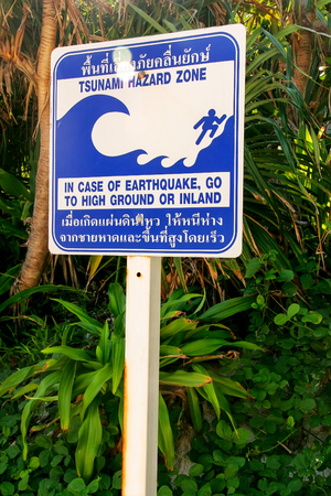Tsunami hazard zone sign on Phi Phi Leh Island, Krabi province, Thailand. The island was hit by the Indian Ocean tsunami in December 2004.の写真素材