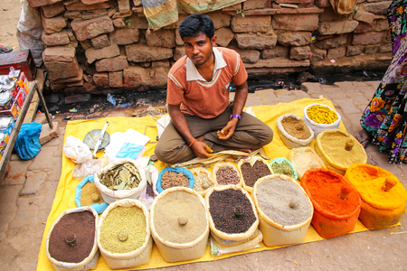 Local man selling spices at the street market in Fatehpur Sikri, Uttar Pradesh, India. The city was founded in 1569 by the Mughal Emperor Akbar, and served as the capital of the Mughal Empire from 1571 to 1585のeditorial素材