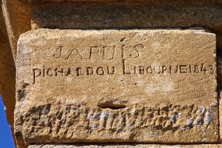 19th century graffiti on Pont du Gard, southern France. It is the highest of all elevated Roman aqueducts.の写真素材