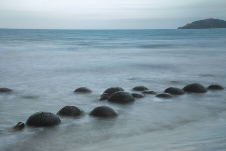 Moeraki Boulders at dusk on Koekohe Beach, Otago, South Island, New Zealand.の写真素材