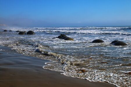 Moeraki Boulders during high tide, Koekohe Beach, Otago, South Island, New Zealand.の写真素材