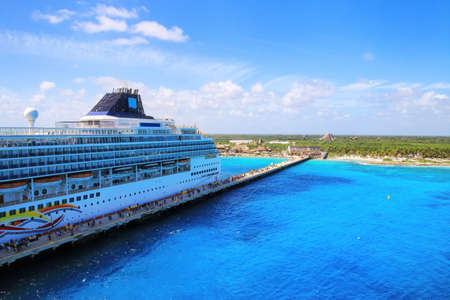 View of cruise ship and a terminal near Mahahual village, Costa Maya, Mexico. Mahahual is now a...