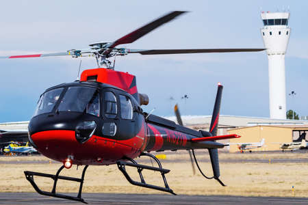 Saberair helicopter landing at Centennial airport near Denver, Colorado. This airport is one of the...