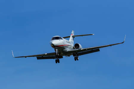 Raytheon Hawker airplane flying at Centennial airport near Denver, Colorado. This airport is one of...