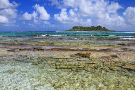 Coastline of White Island with Saline Island in the distance, Grenada.の写真素材